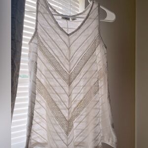 Cato size S. White.  Pattern on front and back.